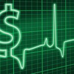 Monitor cardíaco formando a cifrão de dinheiro, para relacionar o lucro dos planos de saúde