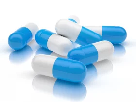 Pílulas azuis e brancas